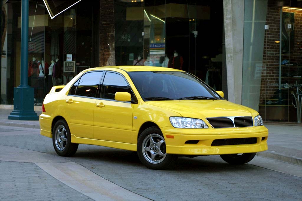 yellow mitsubishi lancer 2022 interior