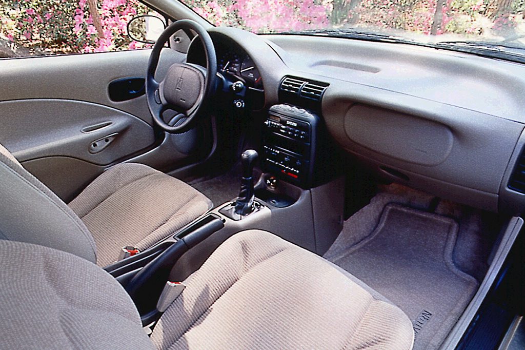 1997 02 Saturn Coupe Consumer Guide Auto