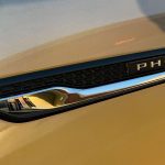 PHEV badge, fender emblem