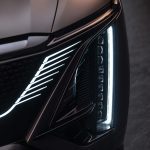 Detail shot of the 2026 Cadillac LYRIQ-V’s signature vertical front headlamp.