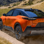 2026 Subaru Uncharted, Orange, rear view, gravel