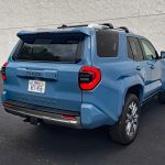 2025 Toyota 4Runner Limited in Heritage Blue, rear 3/4 view,