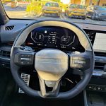2026 Kia K4 Hatchback in Sparkling Yellow, instrument panel, steering wheel,