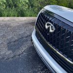 2026 Infiniti QX80 in Radiant White, grille detail, grille closeup,