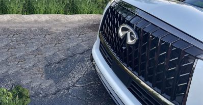 2026 Infiniti QX80 in Radiant White, grille detail, grille closeup,